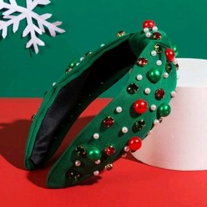 Green headband with stones and pearls